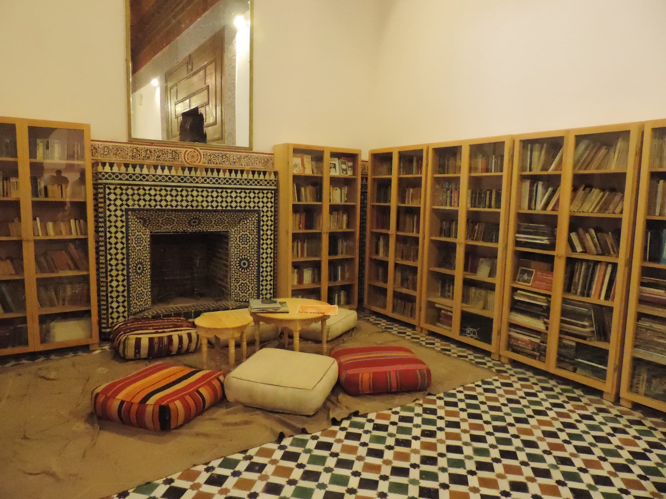 Library room with a zellige-tiled fireplace in Bahia Palace